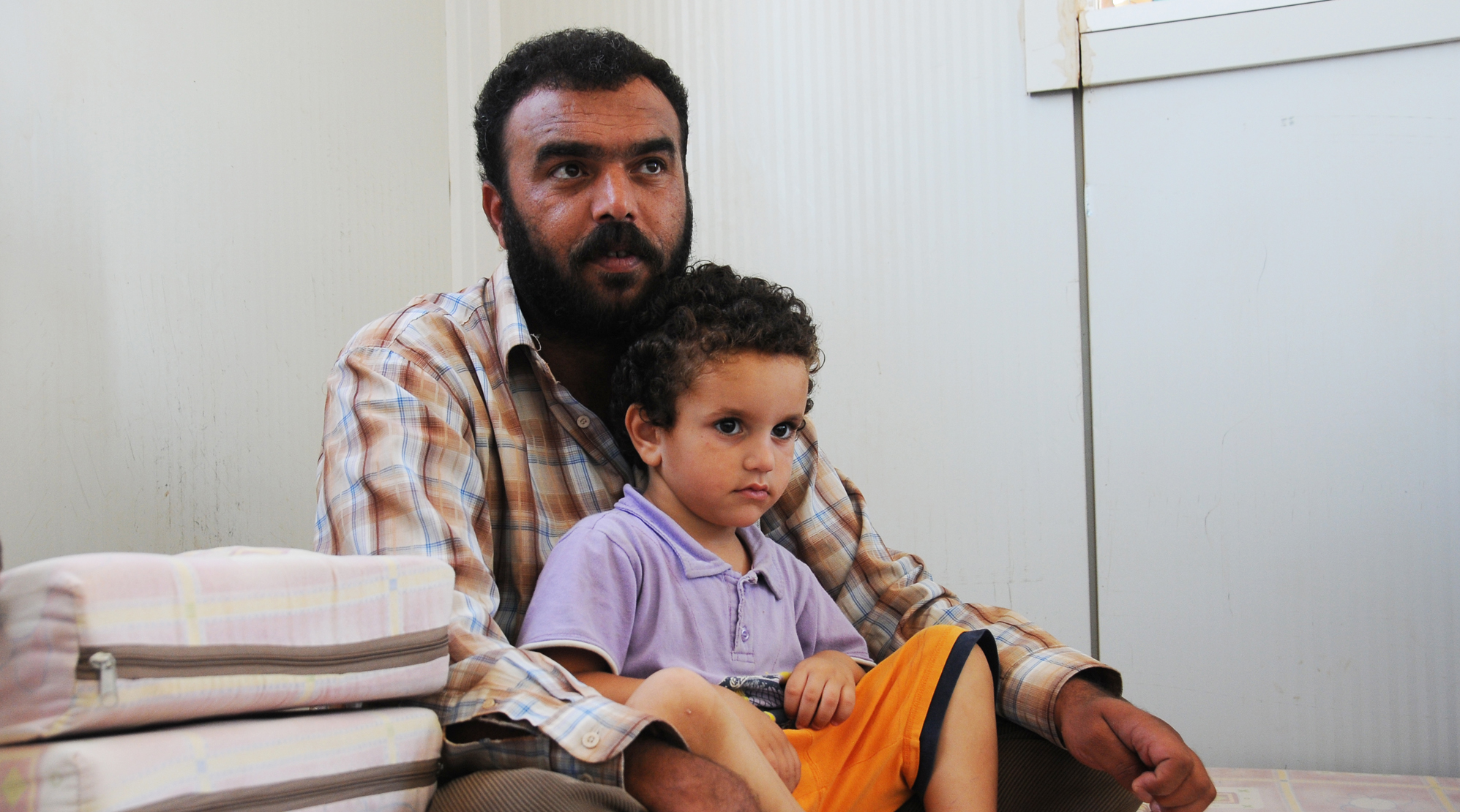 Firas mit seinem John im Za’atari Flüchtlingslager